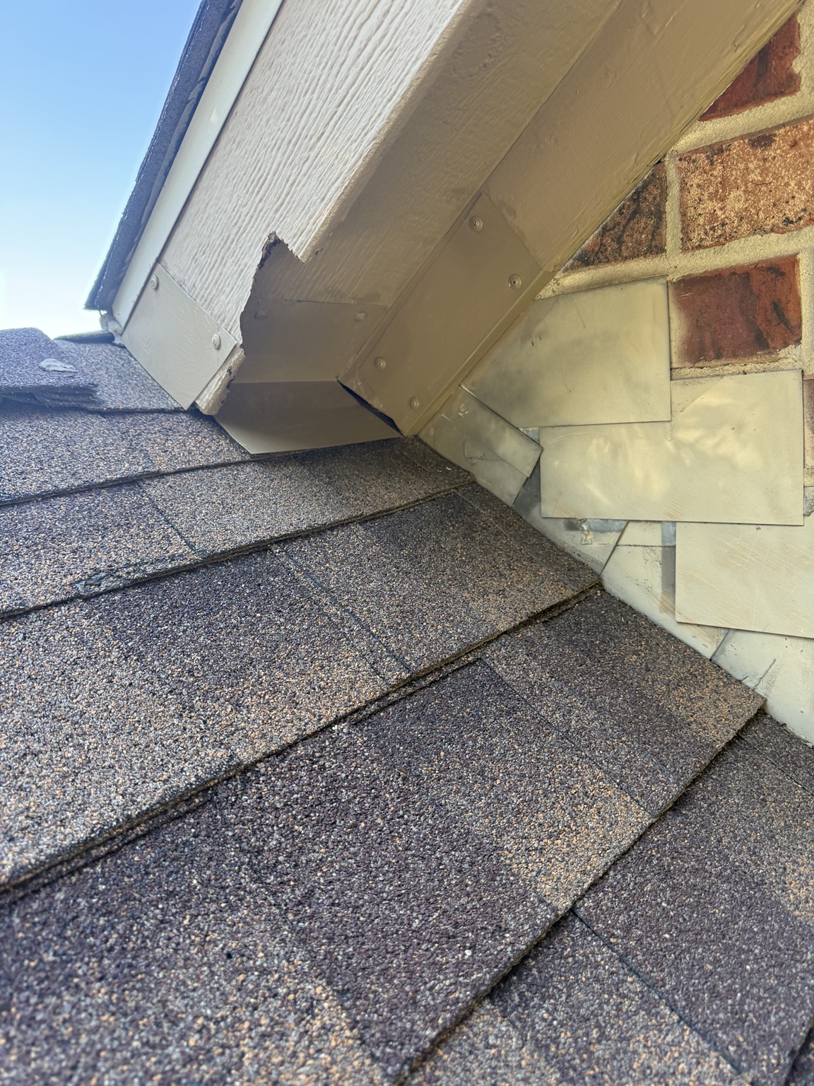 Custom metal exclusion work at a roof return and soffit