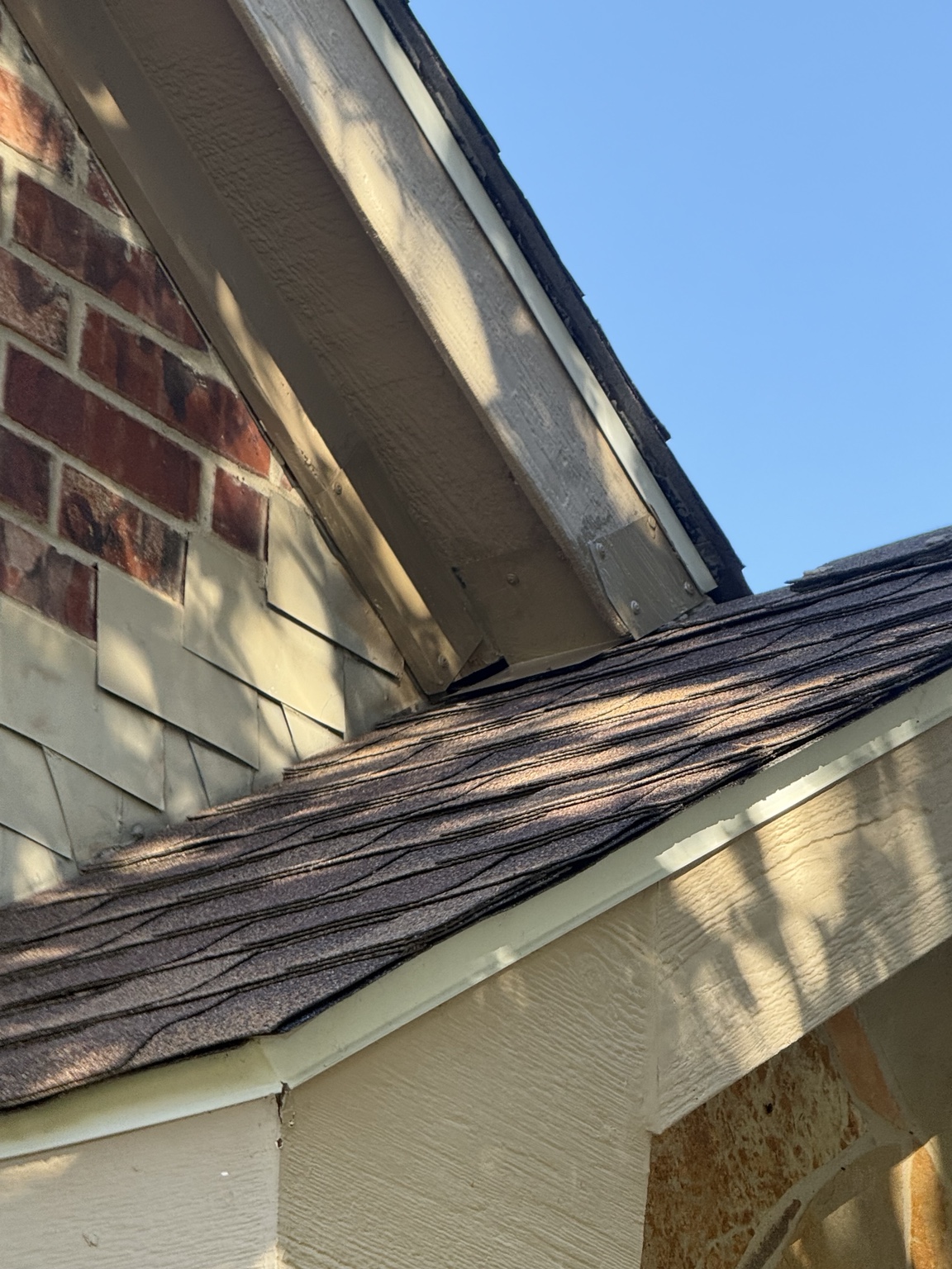 A roofline and soffit transition inspected for potential rodent access
